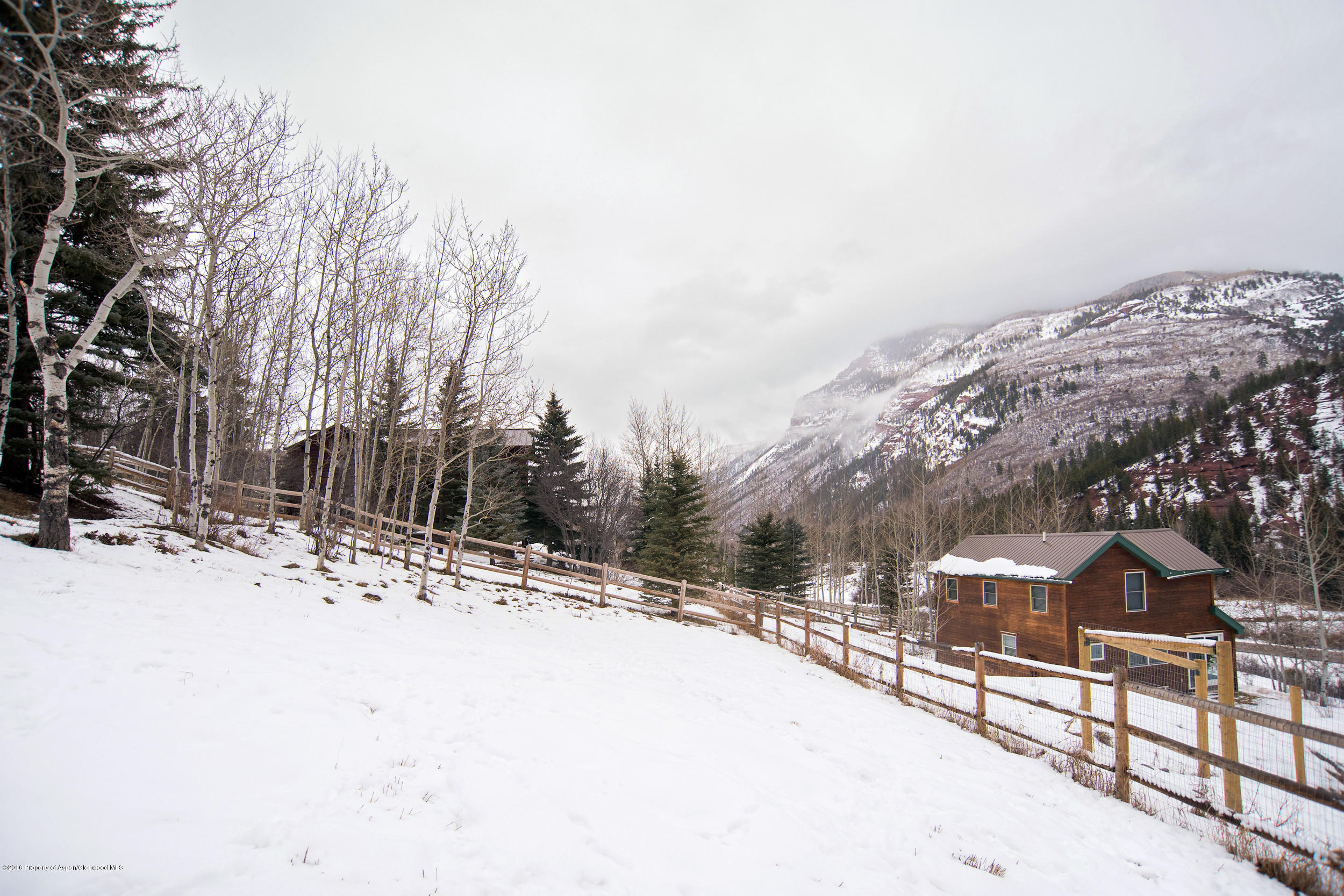 357 Elk Mountain Drive Redstone, CO 81623 - Photo 38 of 40 a view of a snow on the side of a road