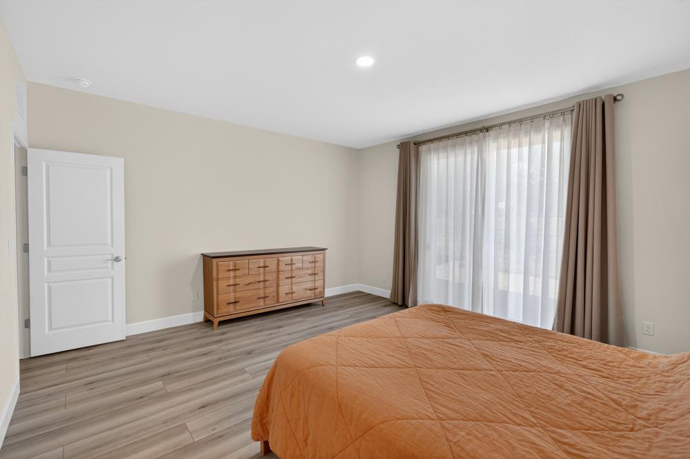 7605 Ferrell Way Elk Grove, CA 95757 - Photo 34 of 69 a bedroom with a bed and a window