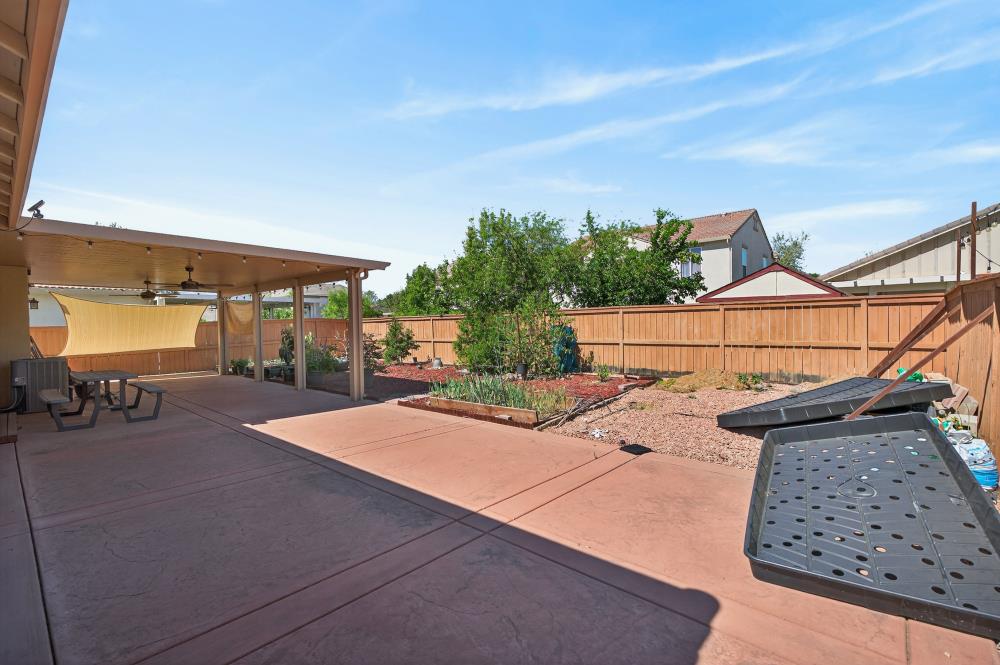 7605 Ferrell Way Elk Grove, CA 95757 - Photo 58 of 69 a backyard of a house with table and chairs