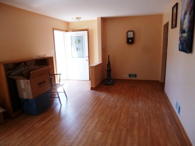 1802 Evergreen Road Homewood, IL 60430 - Photo 8 of 23 wooden floor in an empty room with a window