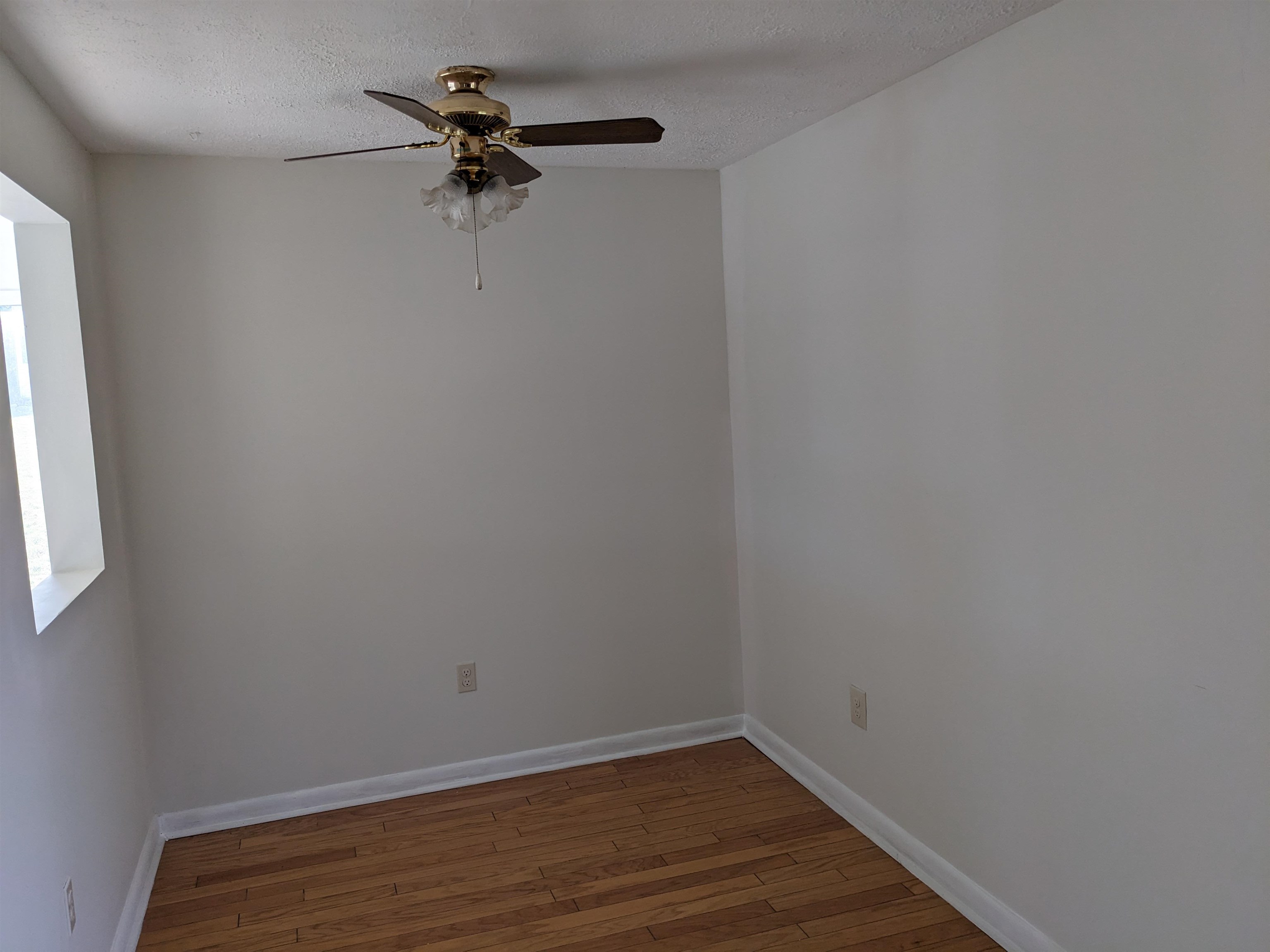 2559 River Road New Market, VA 22844 - Photo 3 of 19 a view of a small space with wooden floor and a window