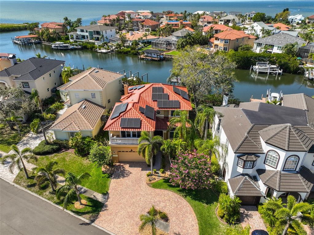 1011 Sonata Lane Apollo Beach, FL 33572 - Photo 1 of 1 an aerial view of a house with a lake view