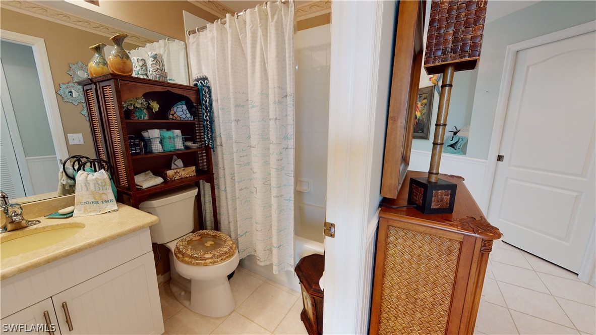 14111 Brant Point Circle, Unit 2201 Fort Myers, FL 33919 - Photo 12 of 30 a bathroom with a sink toilet and shower