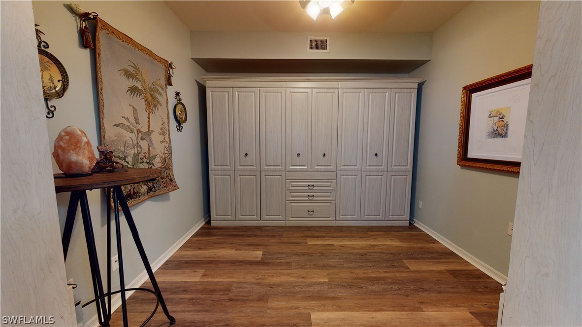 14111 Brant Point Circle, Unit 2201 Fort Myers, FL 33919 - Photo 13 of 30 a view of a hallway with closet area