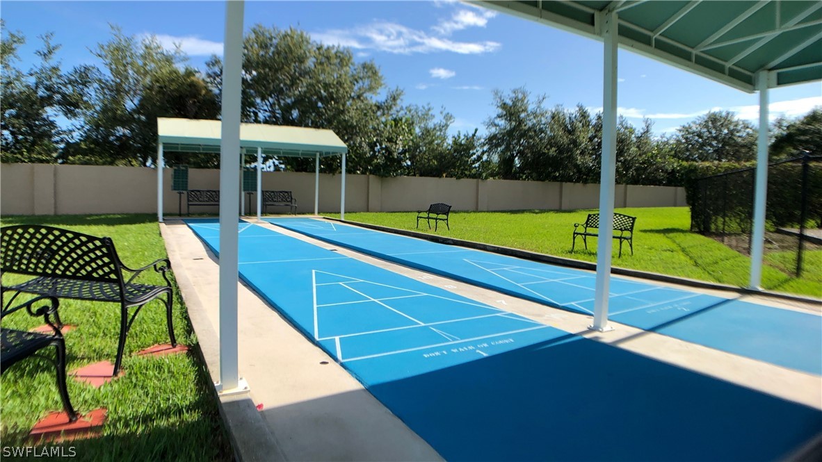 14111 Brant Point Circle, Unit 2201 Fort Myers, FL 33919 - Photo 29 of 30 a view of a backyard with swimming pool