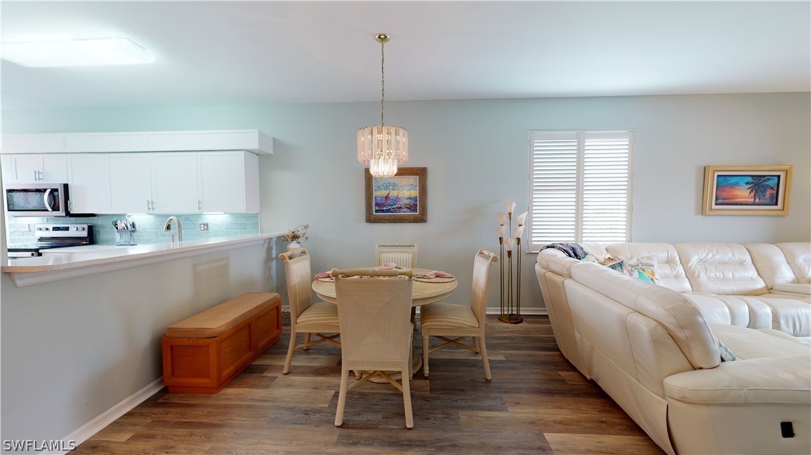 14111 Brant Point Circle, Unit 2201 Fort Myers, FL 33919 - Photo 4 of 30 a dining room with furniture and window