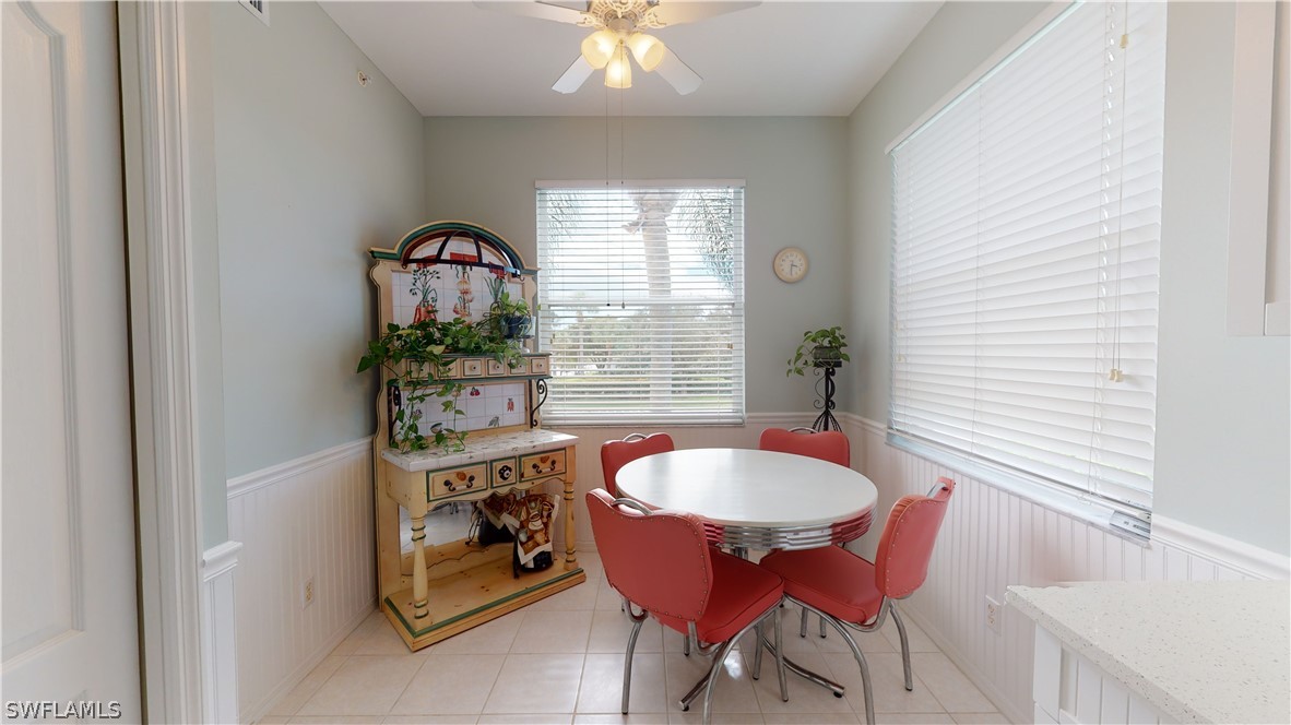 14111 Brant Point Circle, Unit 2201 Fort Myers, FL 33919 - Photo 10 of 30 a dining room with furniture and window