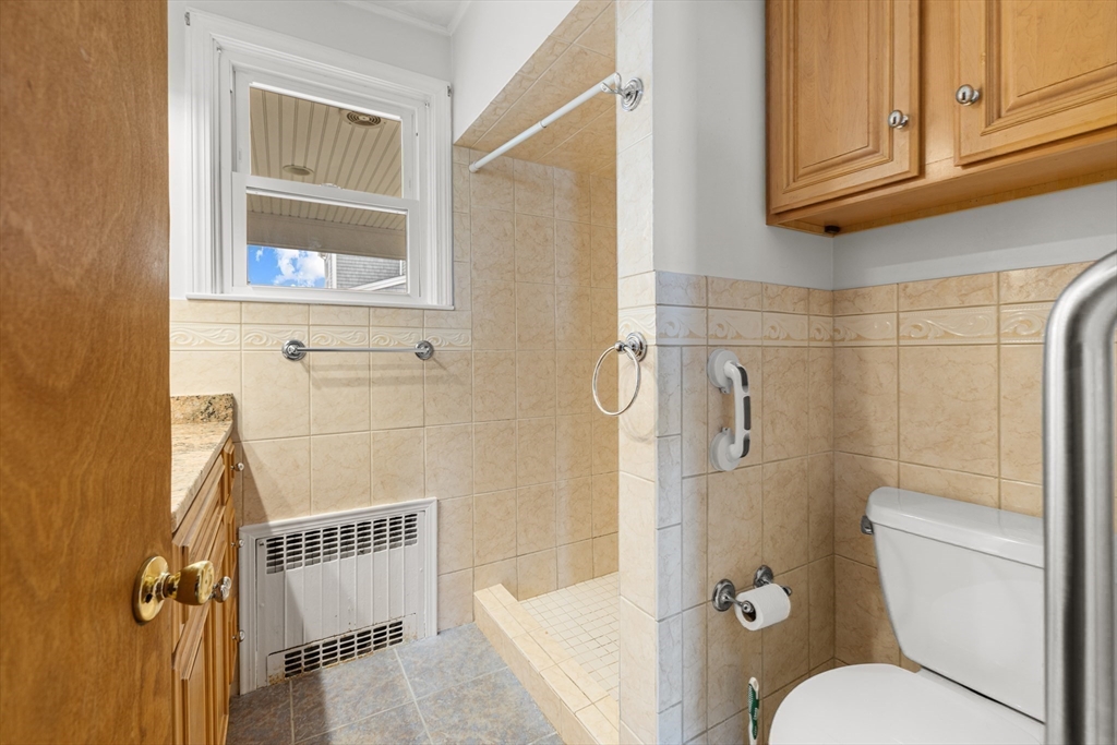 16 Reservation Road Fairhaven, MA 02719 - Photo 20 of 39 a bathroom with a toilet and a shower