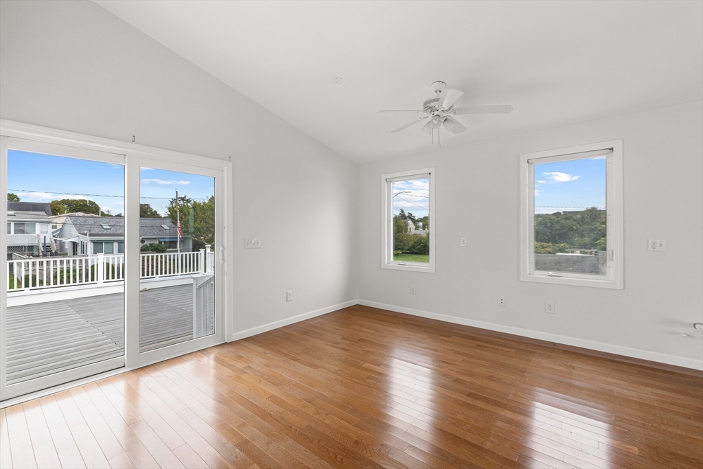 16 Reservation Road Fairhaven, MA 02719 - Photo 21 of 39 wooden floor in an empty room with a window