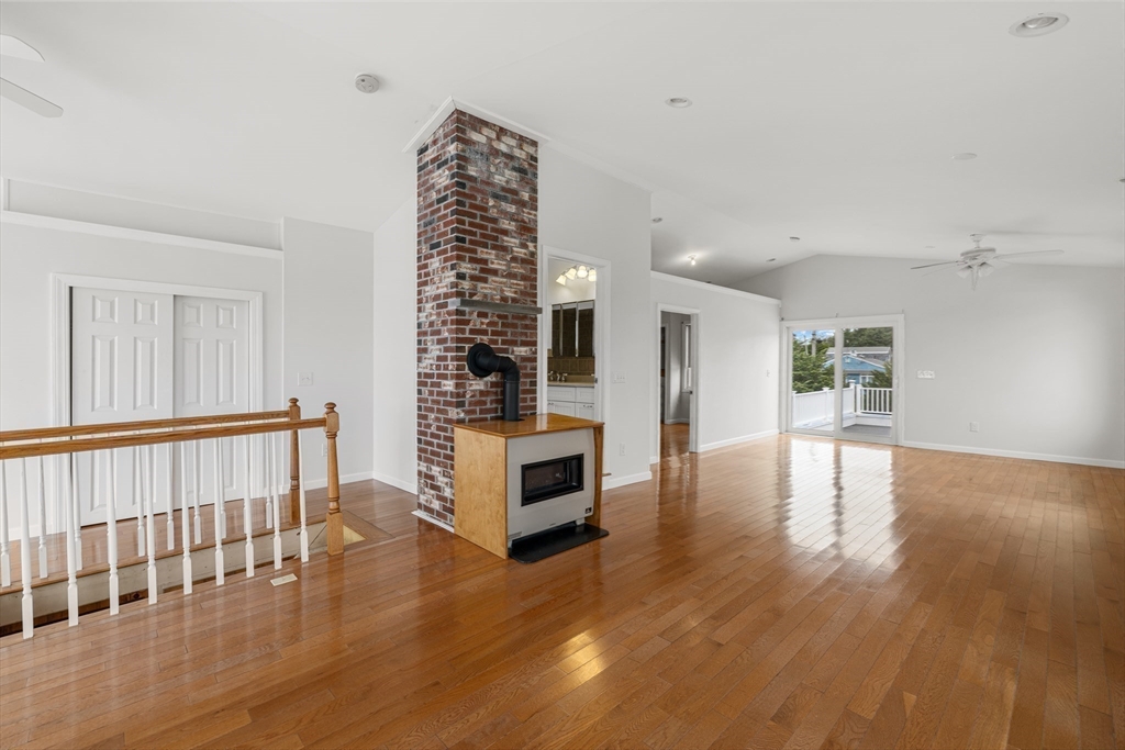 16 Reservation Road Fairhaven, MA 02719 - Photo 23 of 39 a view of an empty room with wooden floor and a window