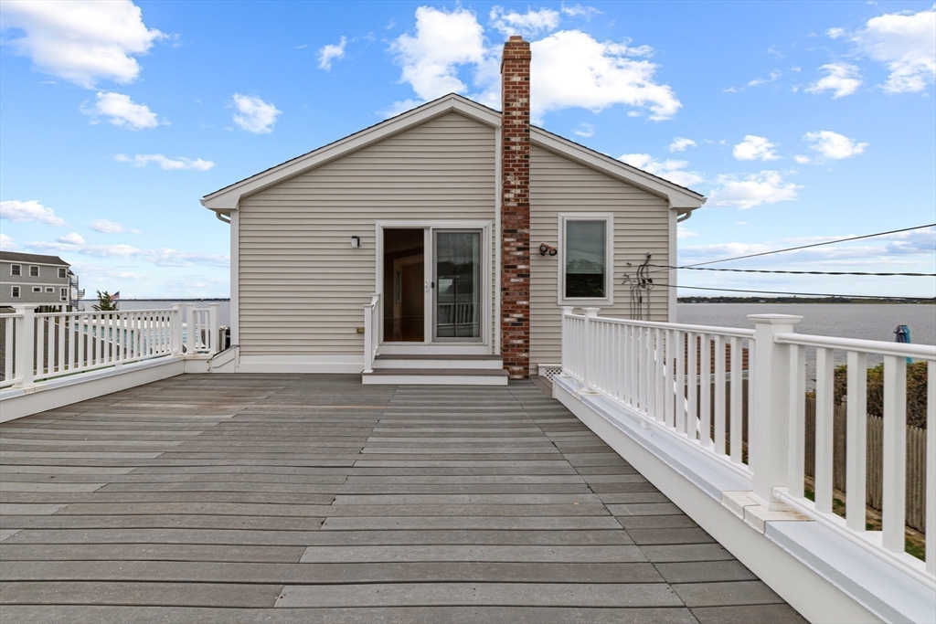 16 Reservation Road Fairhaven, MA 02719 - Photo 33 of 39 a view of a house with wooden deck