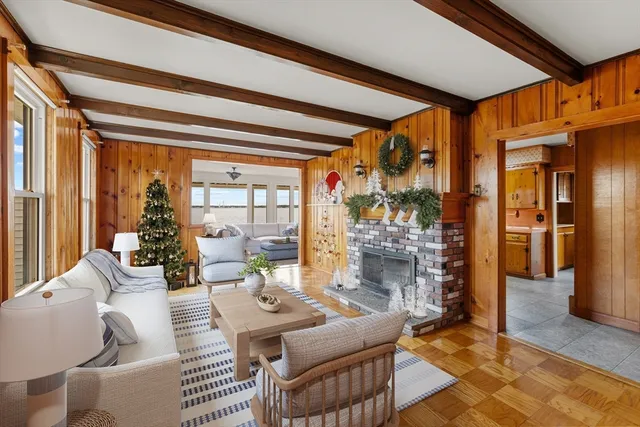 a view of a house with wooden fence