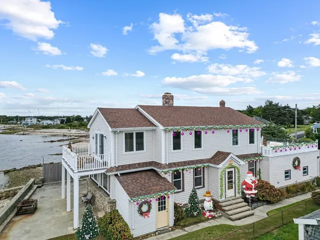 a bathroom with a granite countertop toilet a mirror and a sink