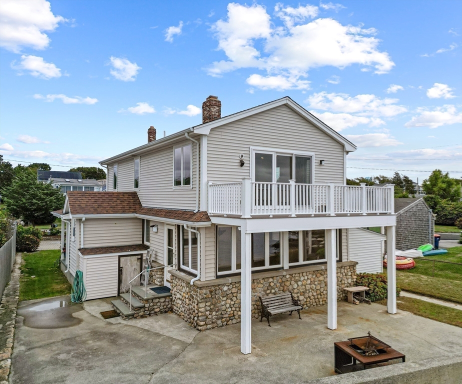 16 Reservation Road Fairhaven, MA 02719 - Photo 8 of 39 a view of a house with a yard and furniture