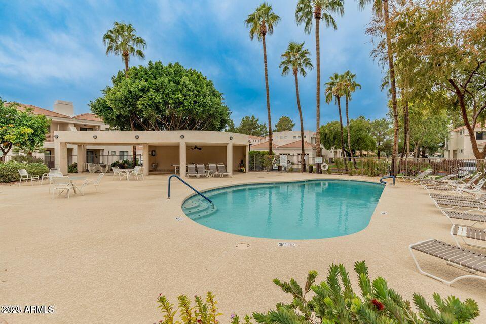 8270 North Hayden Road, Unit 1028 Scottsdale, AZ 85258 - Photo 18 of 22 an aerial view of a house with outdoor space swimming pool and lake view