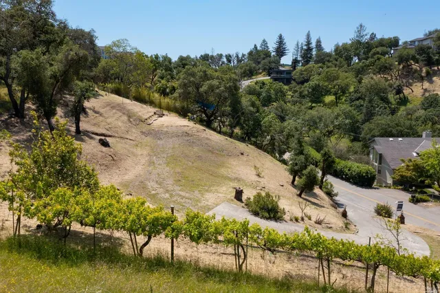 a view of a lake with a house in the background