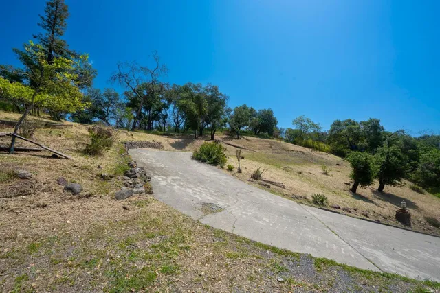 a view of a road with a yard