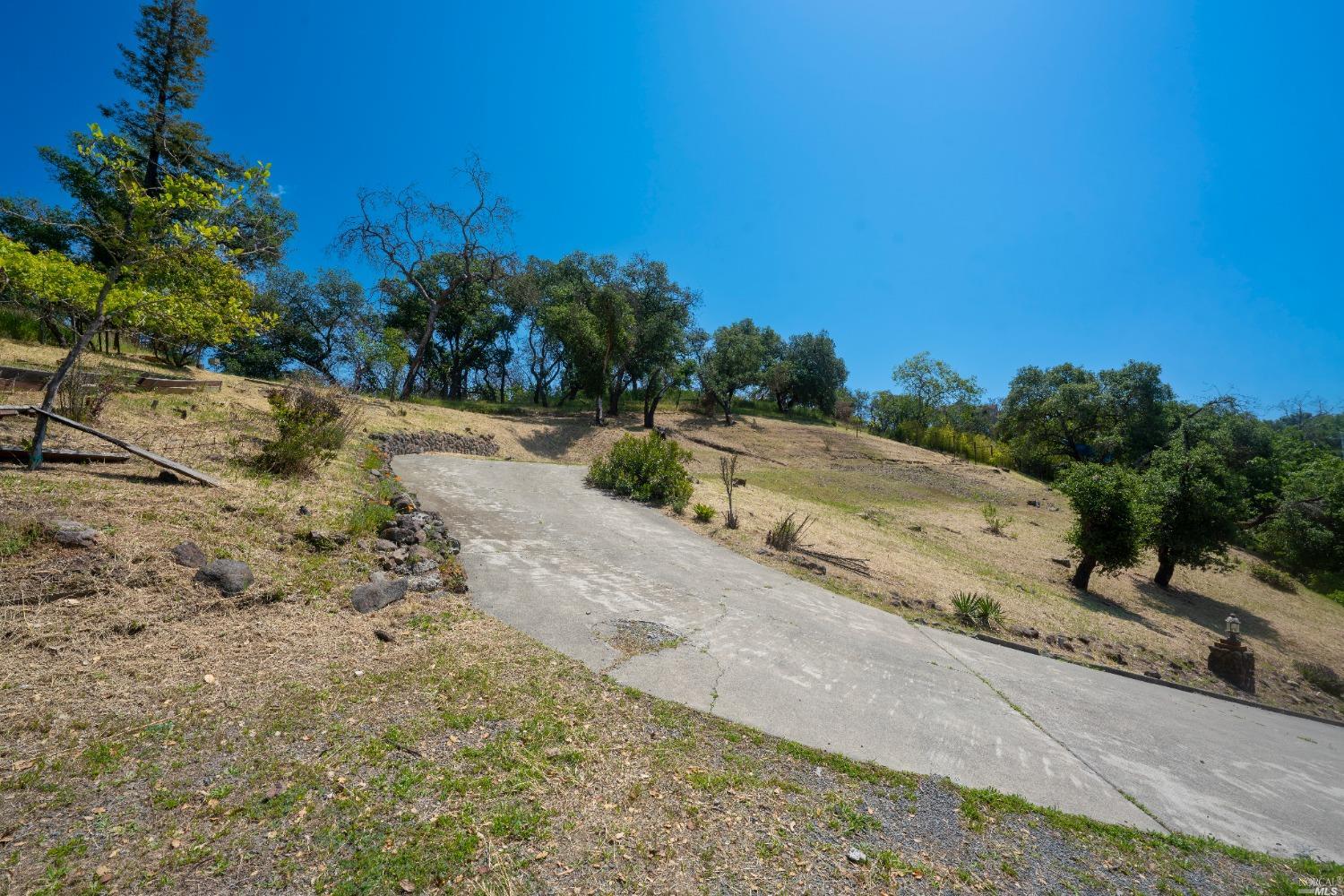 5159 Vista Grande Drive Santa Rosa, CA 95403 - Photo 6 of 30 a view of a road with a yard