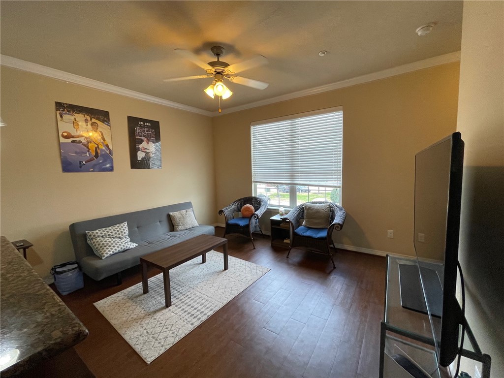1198 Jones-Butler Road, Unit 2706 College Station, TX 77840 - Photo 3 of 17 a living room with furniture and a window