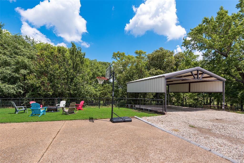 669 VZ County Road Canton, TX 75103 - Photo 11 of 40 a view of a park with plants and a bench