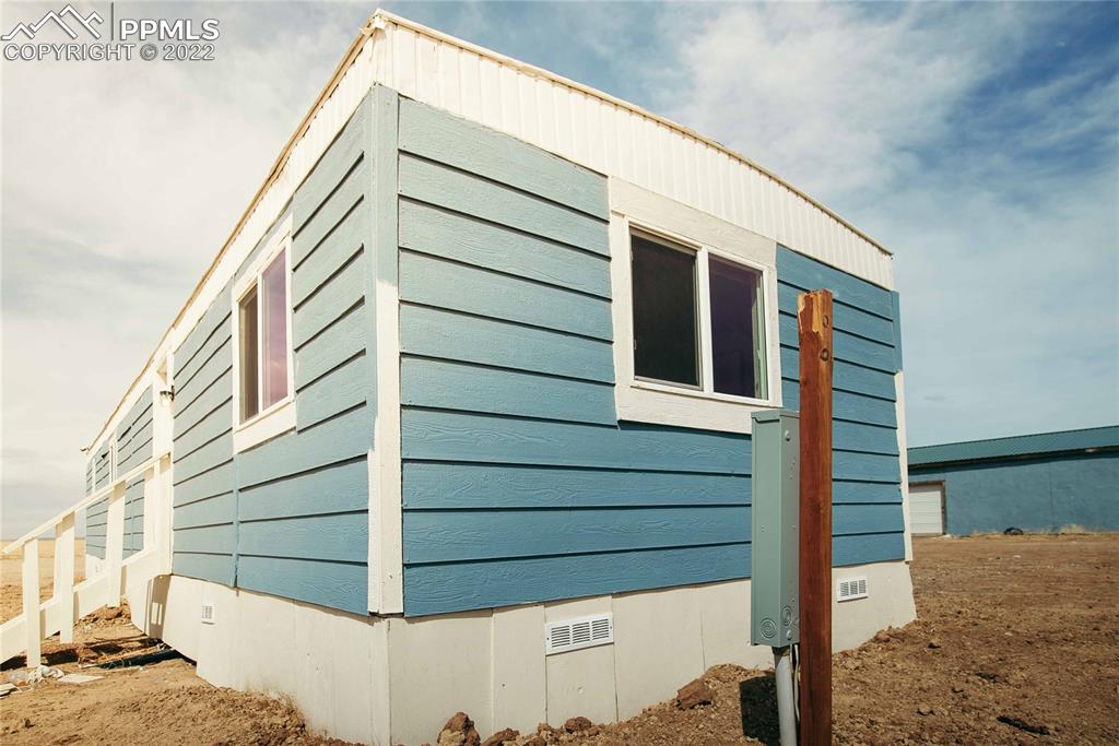 6605 Lauppe Road Yoder, CO 80864 - Photo 33 of 38 a view of front door