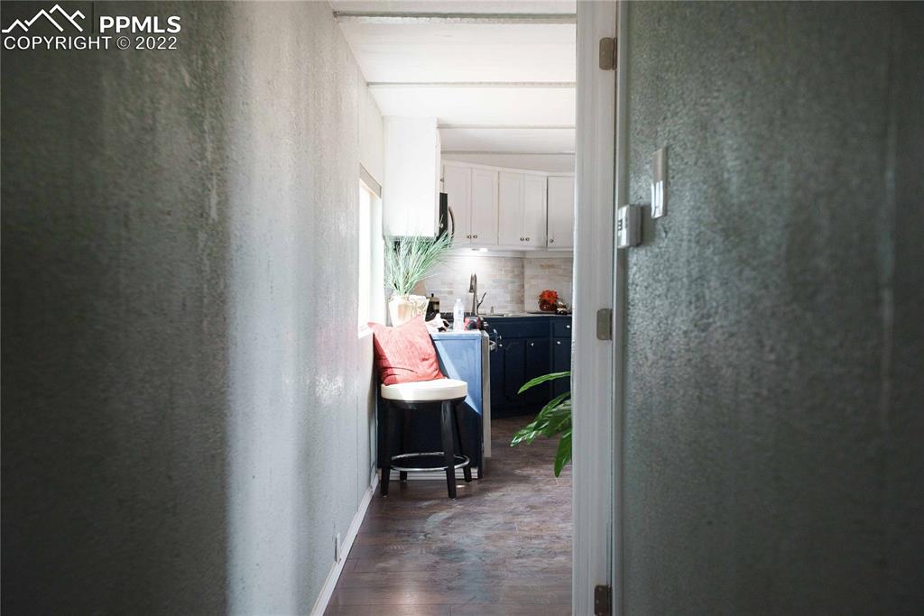 6605 Lauppe Road Yoder, CO 80864 - Photo 38 of 38 a view of a hallway with bathroom