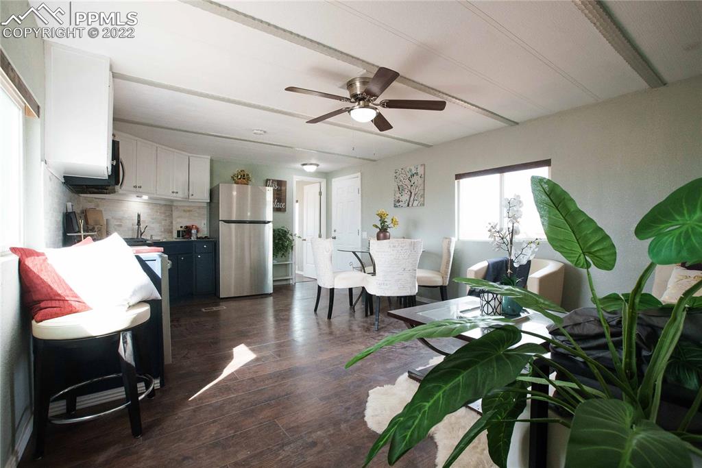 6605 Lauppe Road Yoder, CO 80864 - Photo 5 of 38 a workspace with furniture and a potted plant