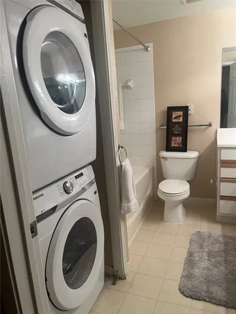 a bathroom with a toilet and a sink