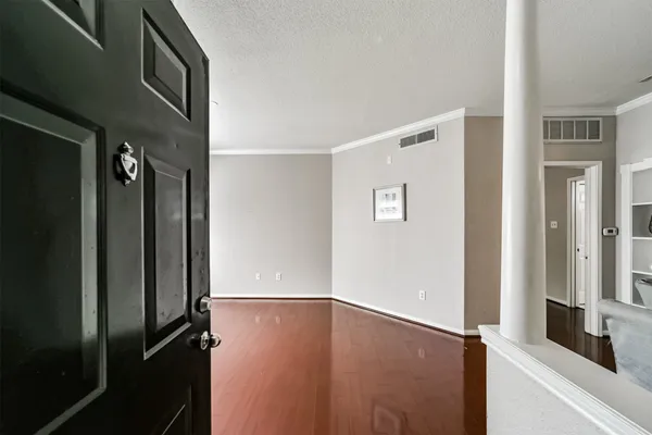 a view of livingroom with furniture and wooden floor