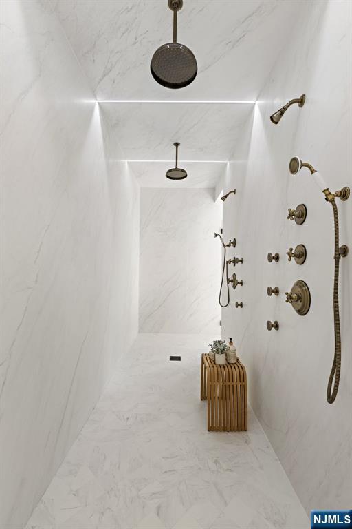 16 Old Farms Road Saddle River, NJ 07458 - Photo 18 of 31 a bathroom with a sink and mirror