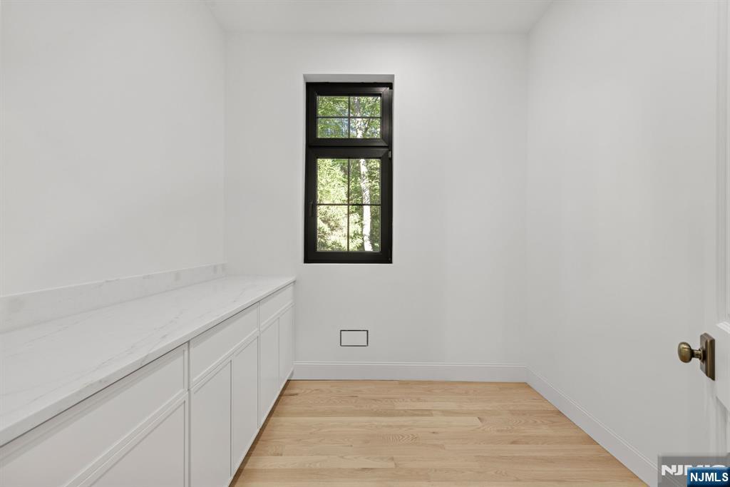 16 Old Farms Road Saddle River, NJ 07458 - Photo 26 of 31 a view of an entryway with wooden floor