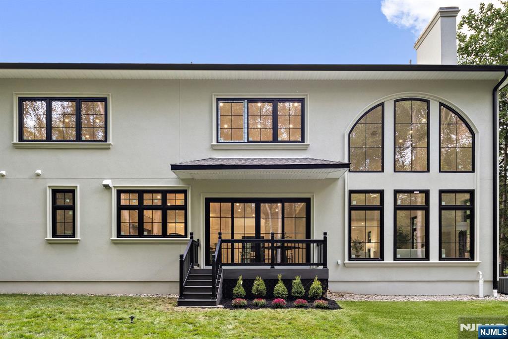 16 Old Farms Road Saddle River, NJ 07458 - Photo 29 of 31 a front view of a house with a yard