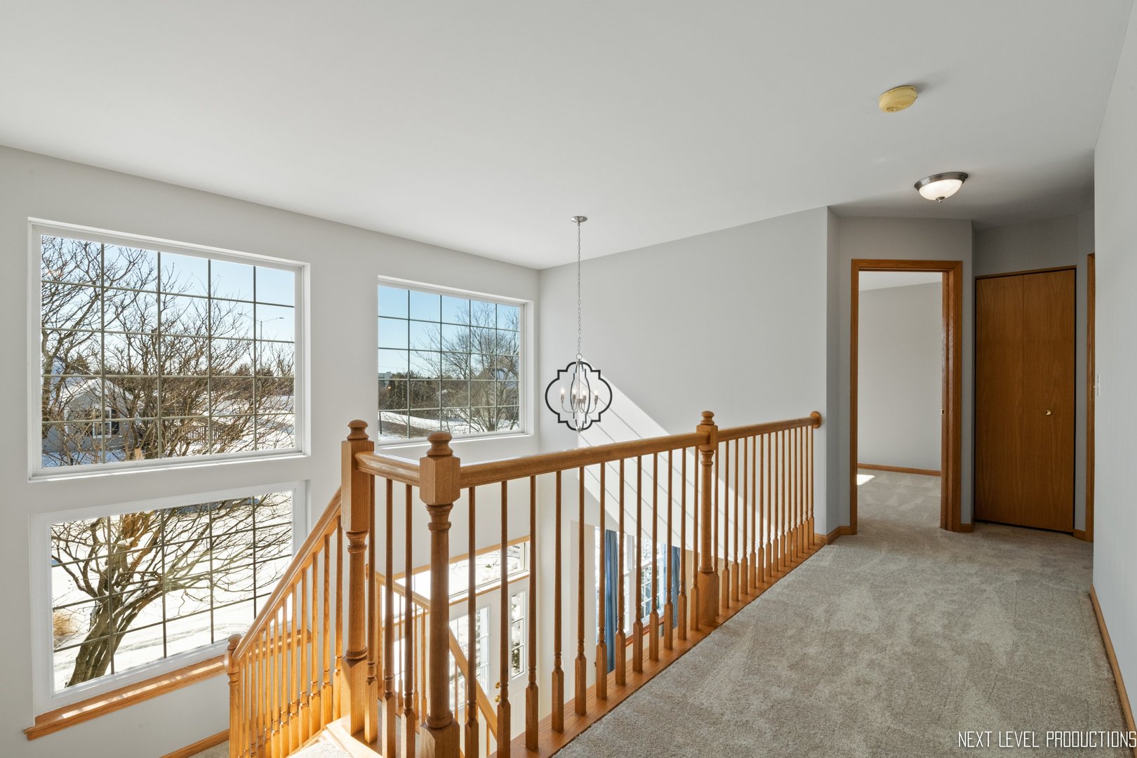 1772 Pinnacle Drive Aurora, IL 60502 - Photo 19 of 48 a view of a hallway to a window and a livingroom