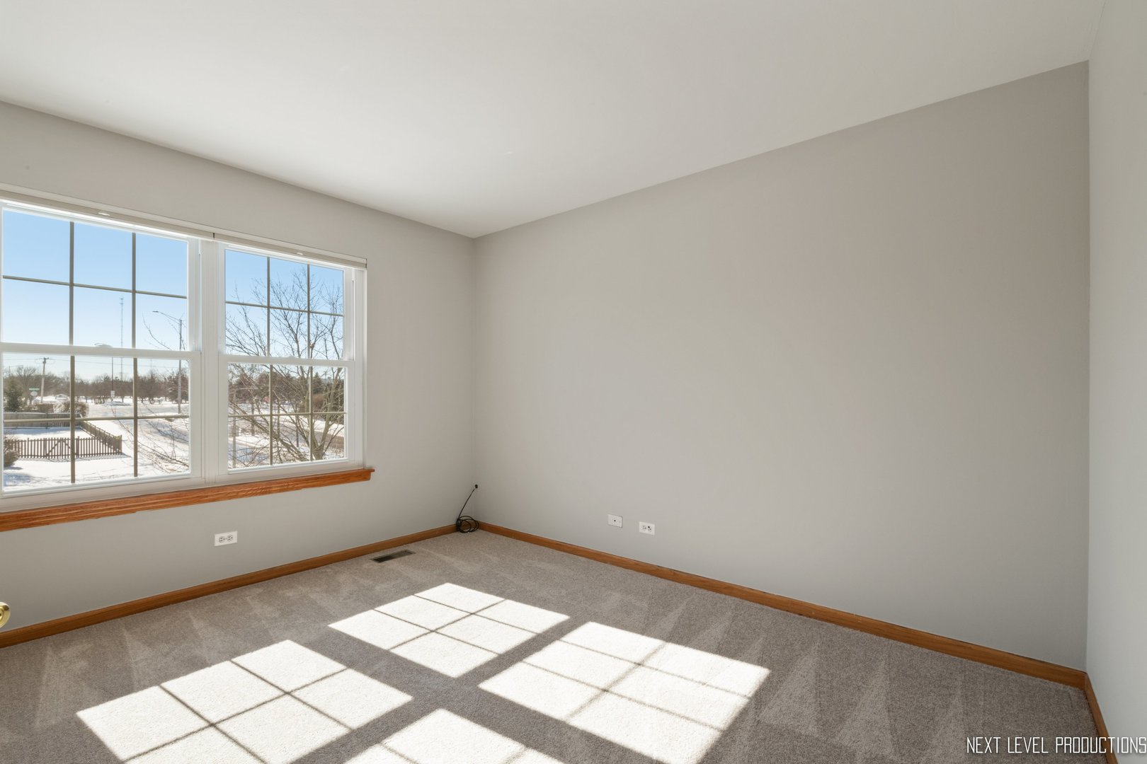 1772 Pinnacle Drive Aurora, IL 60502 - Photo 25 of 48 an empty room with a window