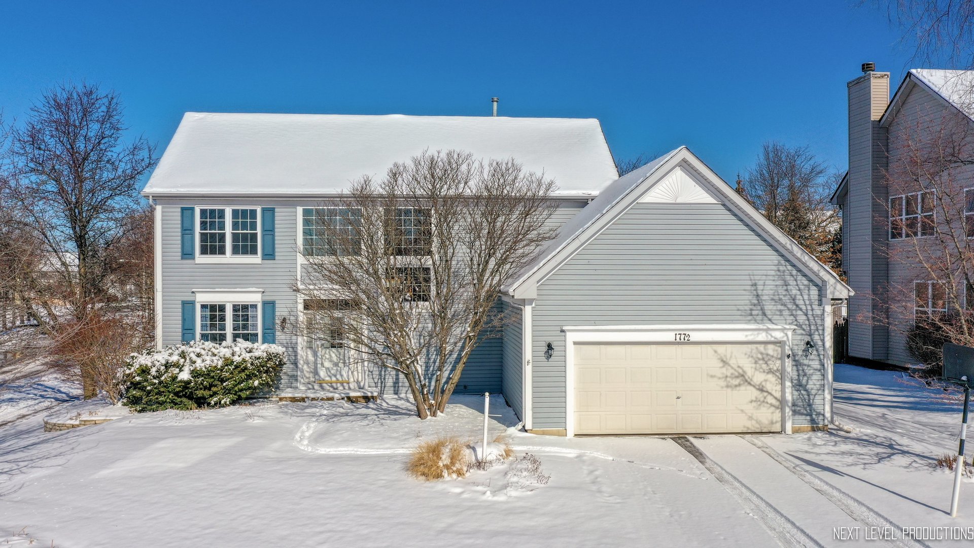 1772 Pinnacle Drive Aurora, IL 60502 - Photo 33 of 48 front view of a house with a yard