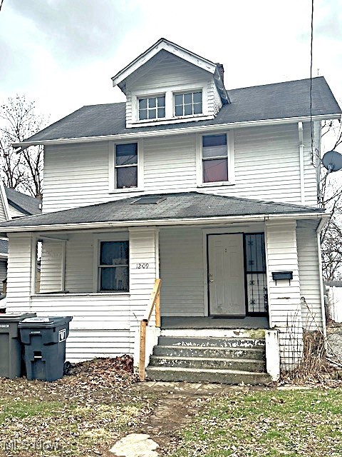 1209 Rice Avenue Lima, OH 45805 - Photo 1 of 14 American foursquare style home with a porch