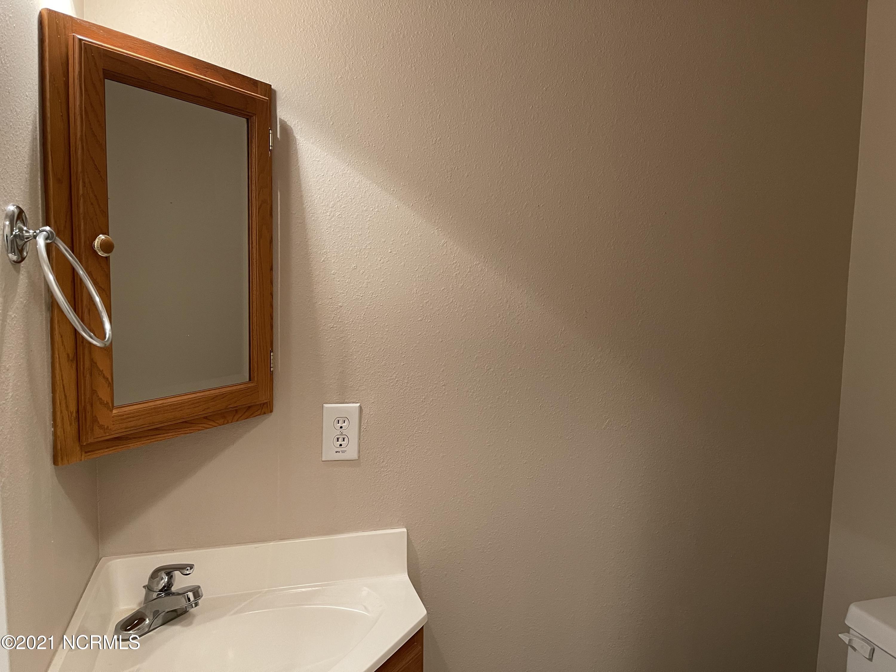 176 Clubhouse Road Sunset Beach, NC 28468 - Photo 12 of 35 Half Bath in Foyer