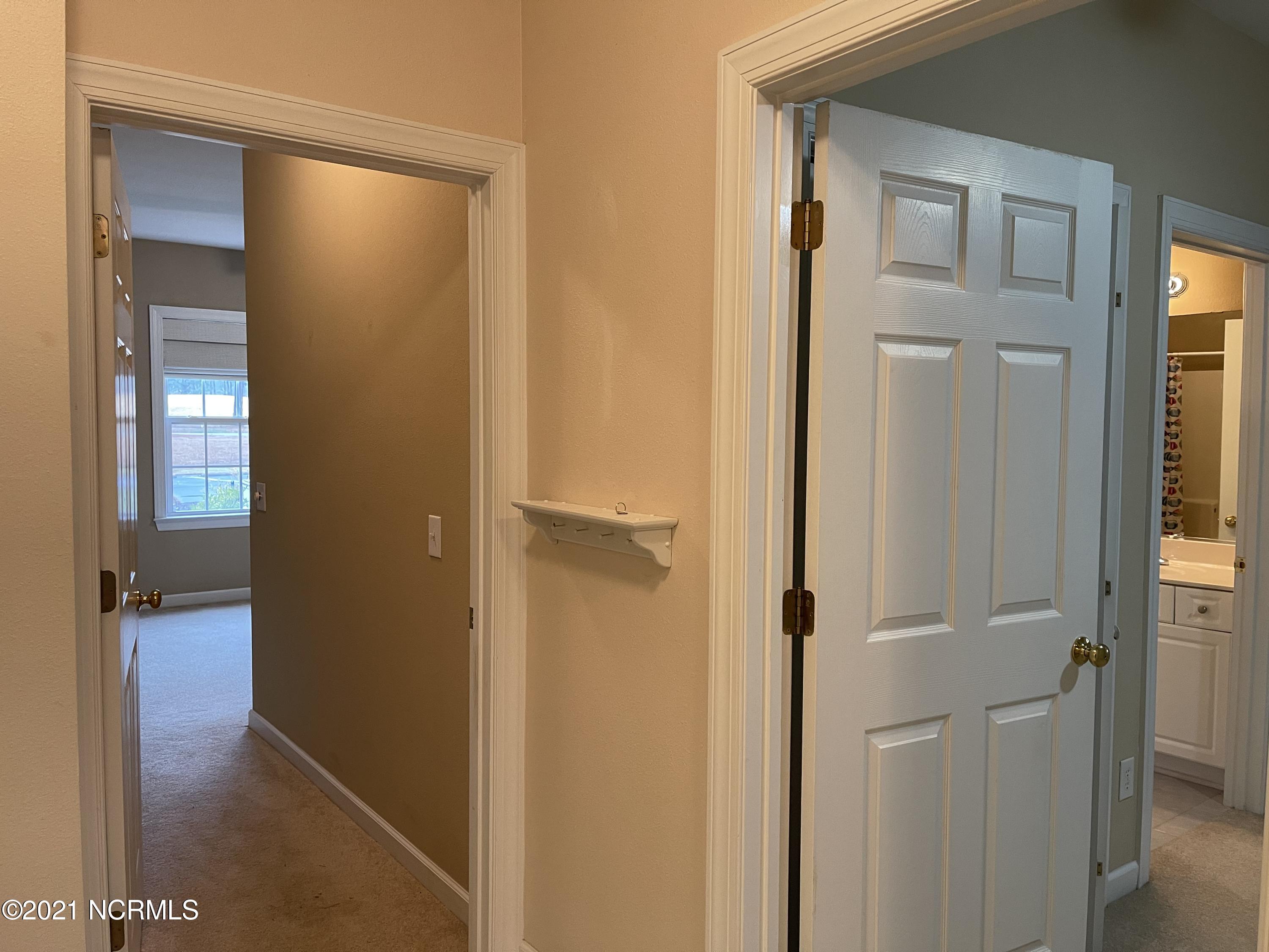 176 Clubhouse Road Sunset Beach, NC 28468 - Photo 13 of 35 Foyer, Bedroom 2 and 3