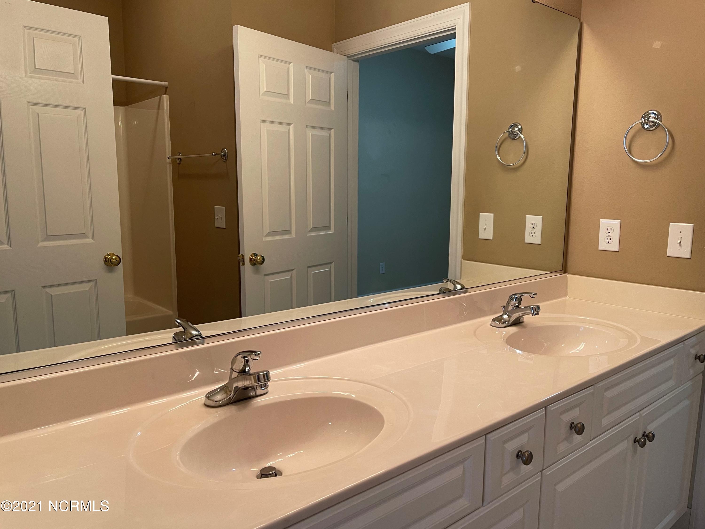 176 Clubhouse Road Sunset Beach, NC 28468 - Photo 16 of 35 Jack N Jill Bath