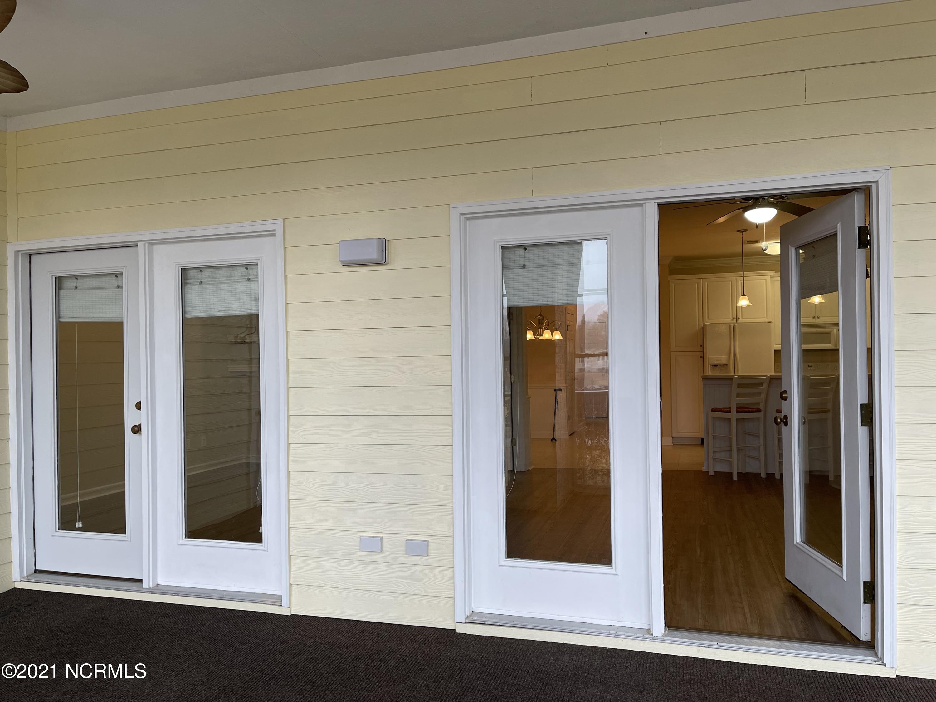 176 Clubhouse Road Sunset Beach, NC 28468 - Photo 25 of 35 Double Doors