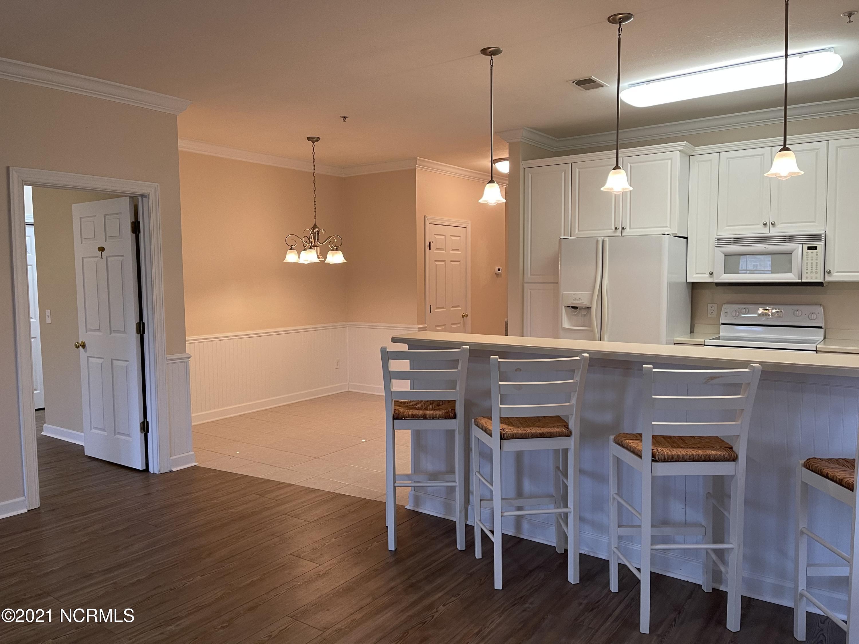 176 Clubhouse Road Sunset Beach, NC 28468 - Photo 6 of 35 Overlooks Dining Area