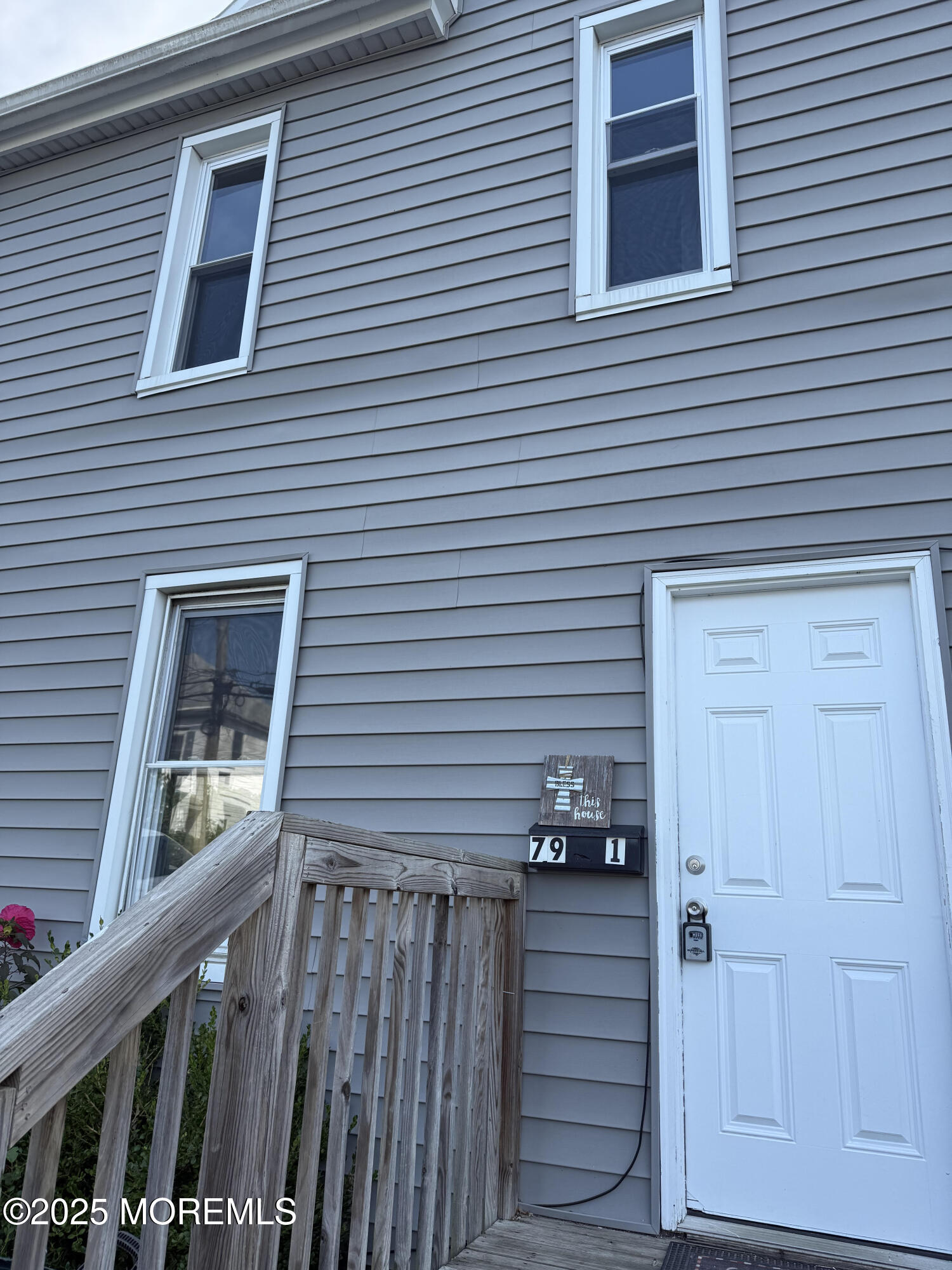 79 4th Avenue, Unit 1 Long Branch, NJ 07740 - Photo 11 of 11 a view of outdoor space and deck