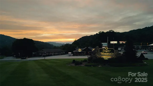 a view of house with outdoor space and yard