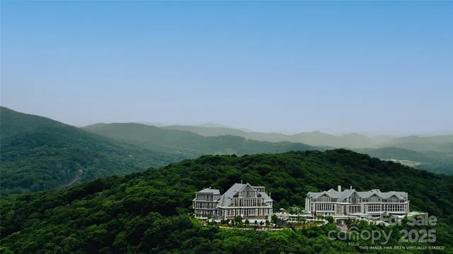 an aerial view of a house with a garden