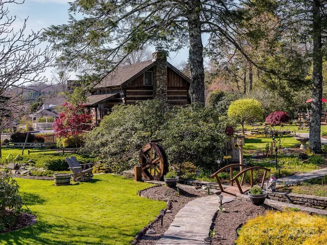 a view of a chair and tables in the patio