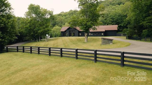 a view of swimming pool with outdoor seating and trees