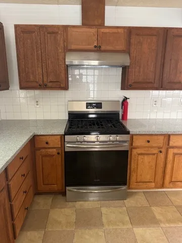 a view of a room that has a window in it