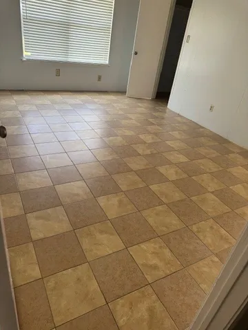 a front view of a house with yard