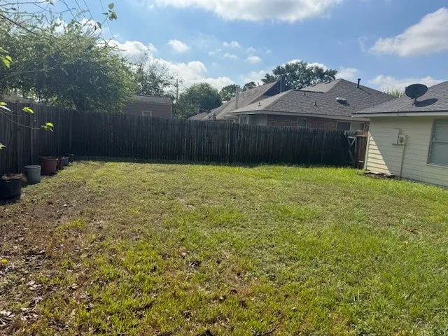 a house view with a garden space