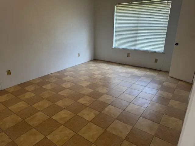 an empty room with a window